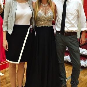 Black and sequined floor-length formal dress